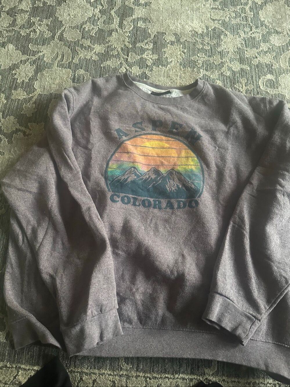 Graphic Images dark gray or washed brown crewneck sweatshirt featuring a colorfu